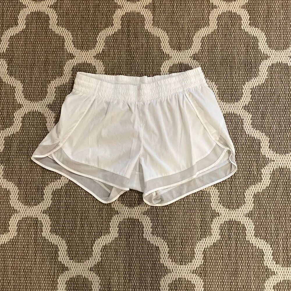 Athleta mesh racer run shorts 4 inches women’s size medium